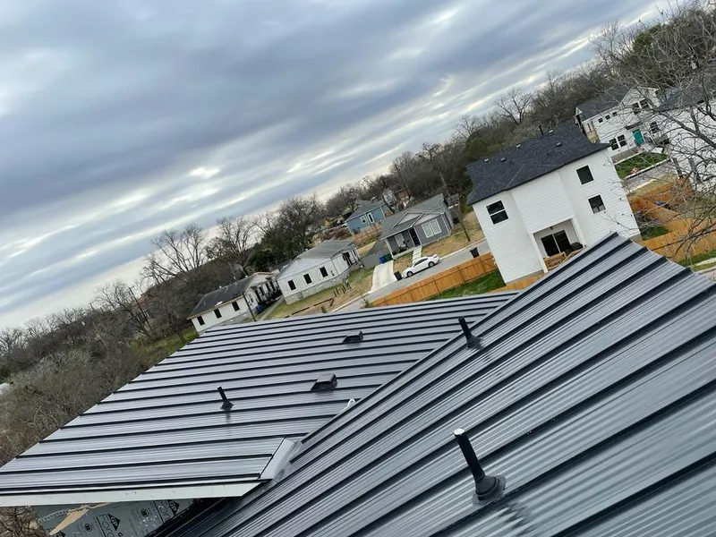 Standing seam metal roof panels with vents for Skylight Repair in East Hills
